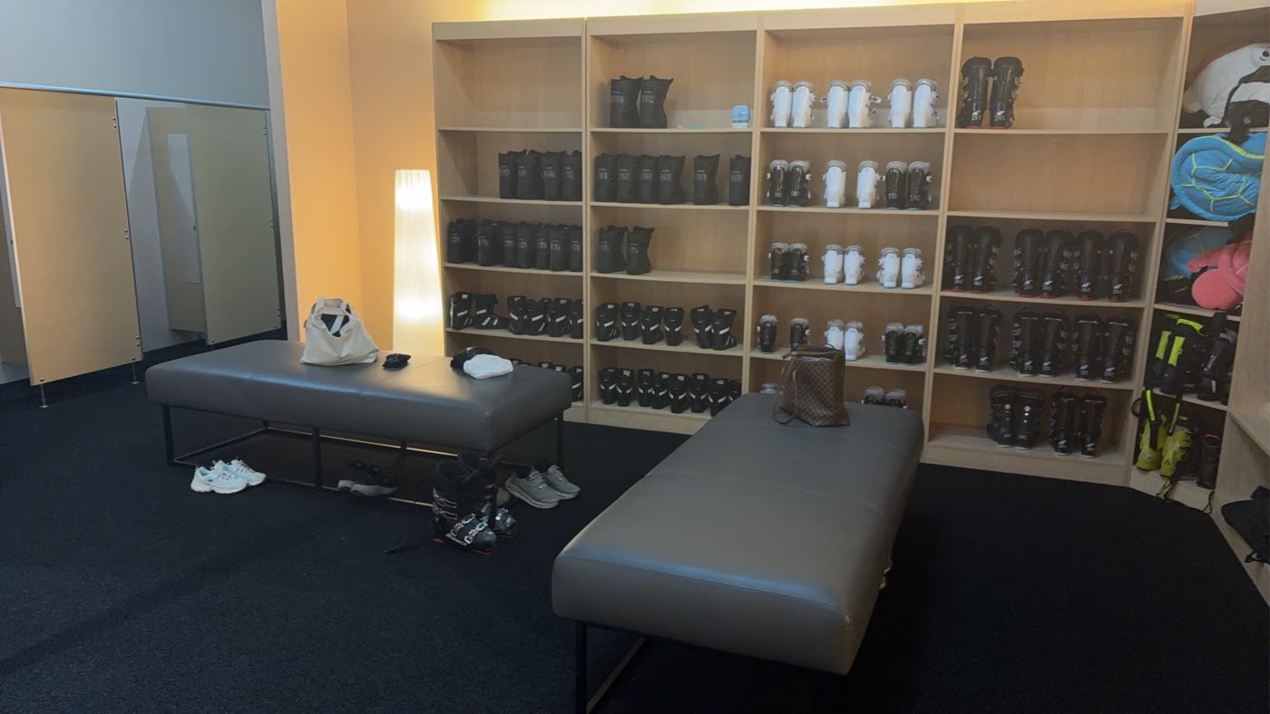 The boot and equipment wall at SKI Academy Thailand